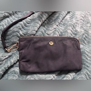 lululemon athletica Black and Gold wristlet wallet.